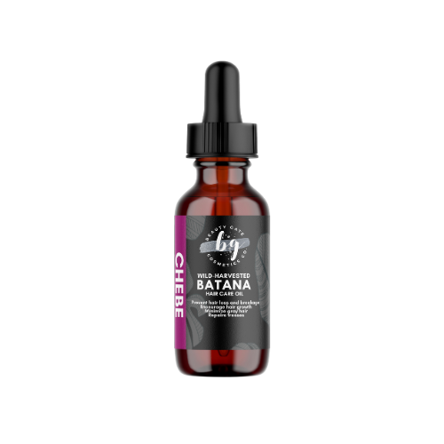 A bottle of hair care oil with a dropper.