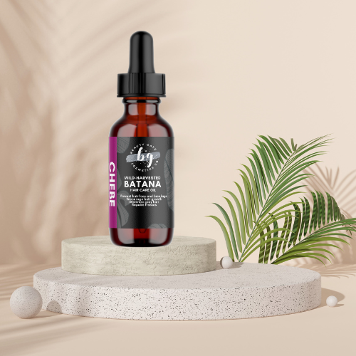 Hair-care oil bottle on a platform, with a palm leaf.