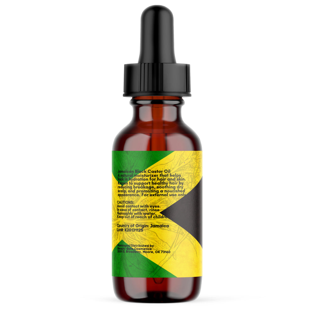 Bottle of Jamaican Black Castor Oil with dropper.