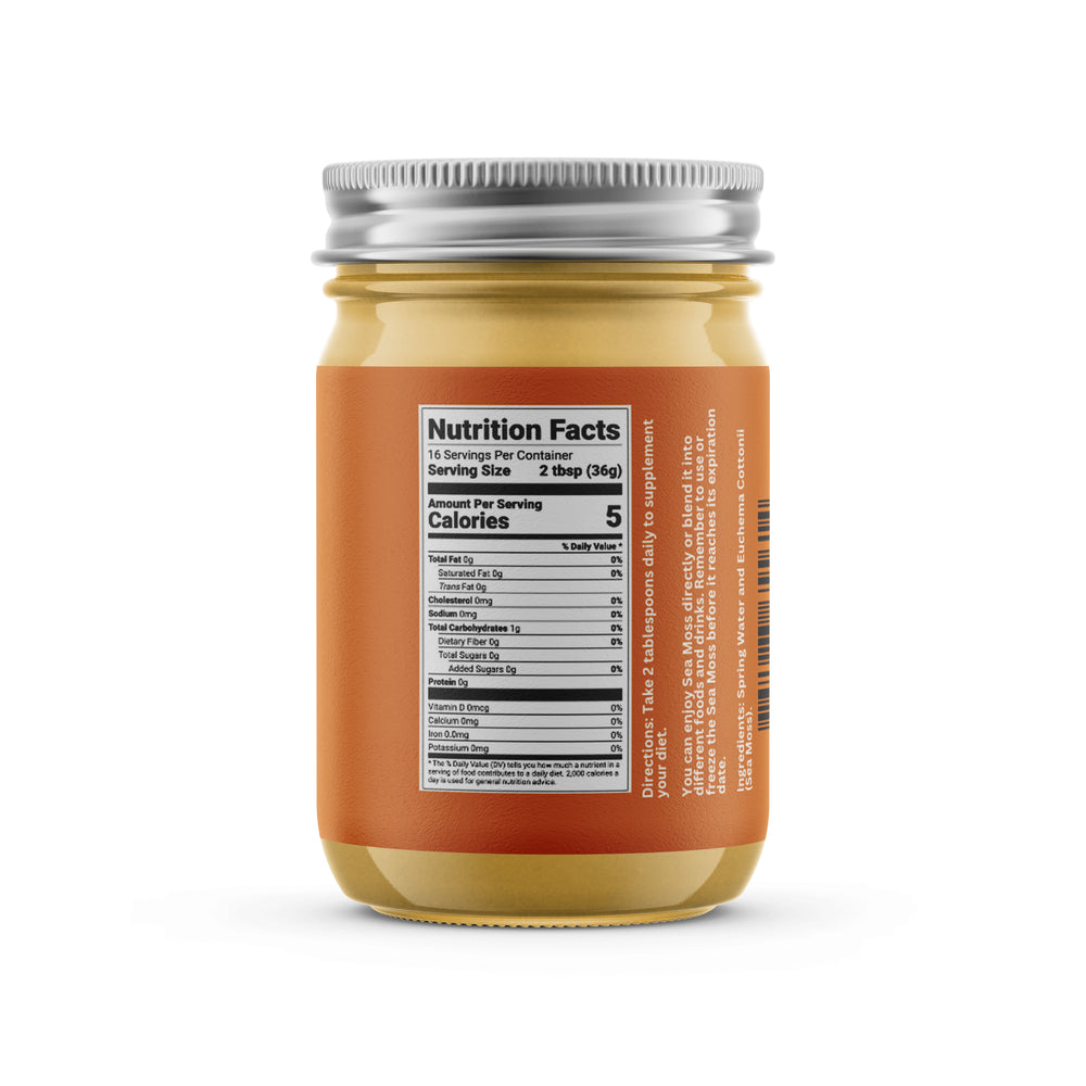 Glass jar filled with yellow sea moss gel, labeled with nutrition facts and usage directions.