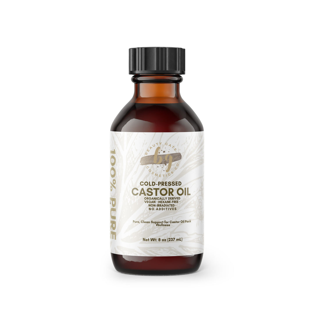 Brown bottle of cold-pressed castor oil with black cap.