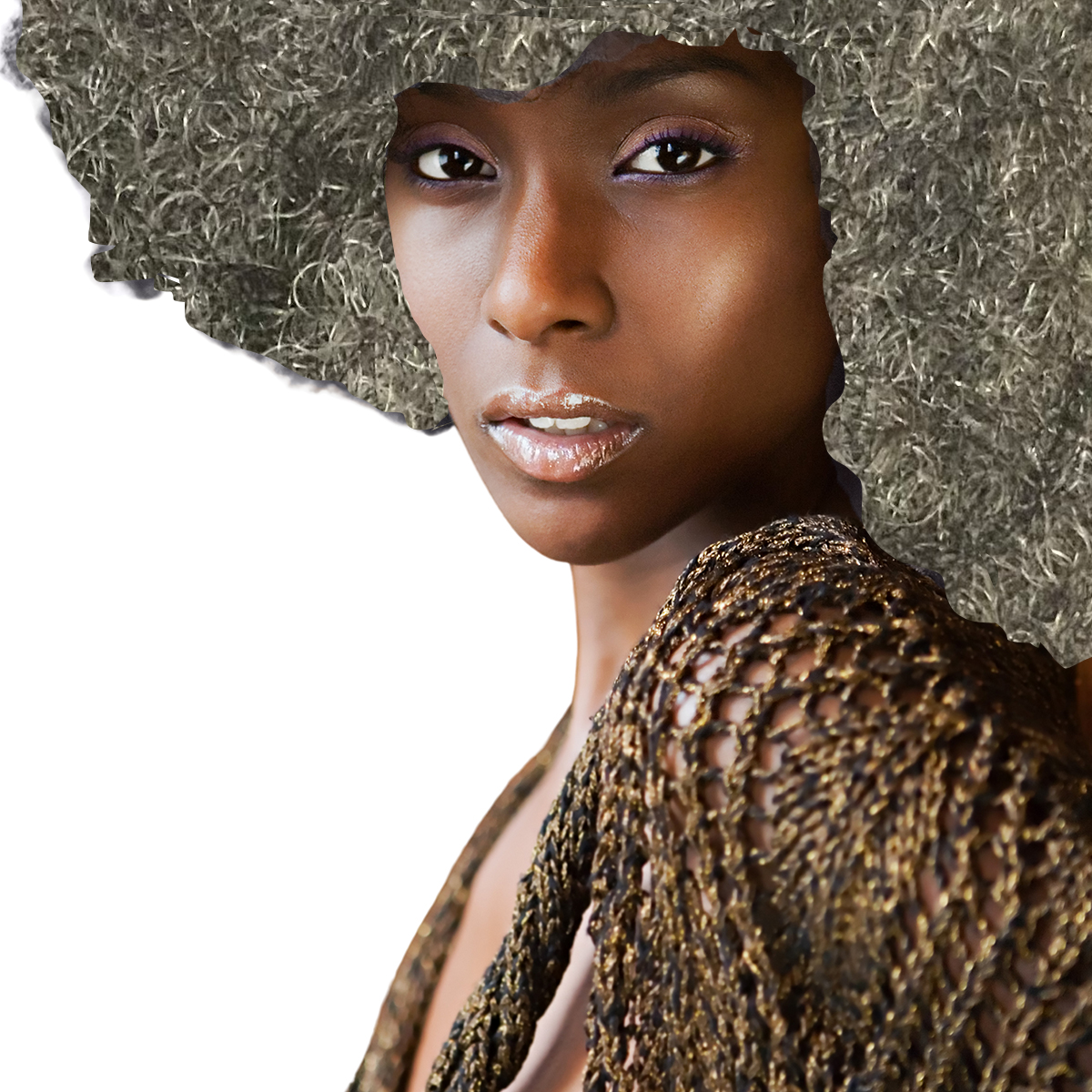 Woman with silver afro and gold crochet shawl.