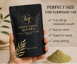 Hand holding a black pouch labeled 'bg' with product details on a beige background