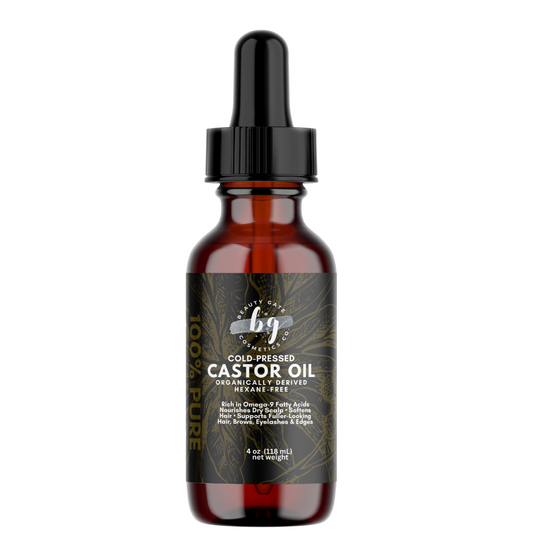 Amber glass bottle with a black dropper, labeled "Beauty Gate Cosmetics Co. Cold-Pressed Castor Oil 100% Pure".
