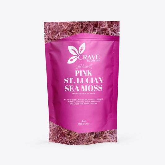 Eye-level studio shot of a pink mylar bag containing pink dried sea moss.